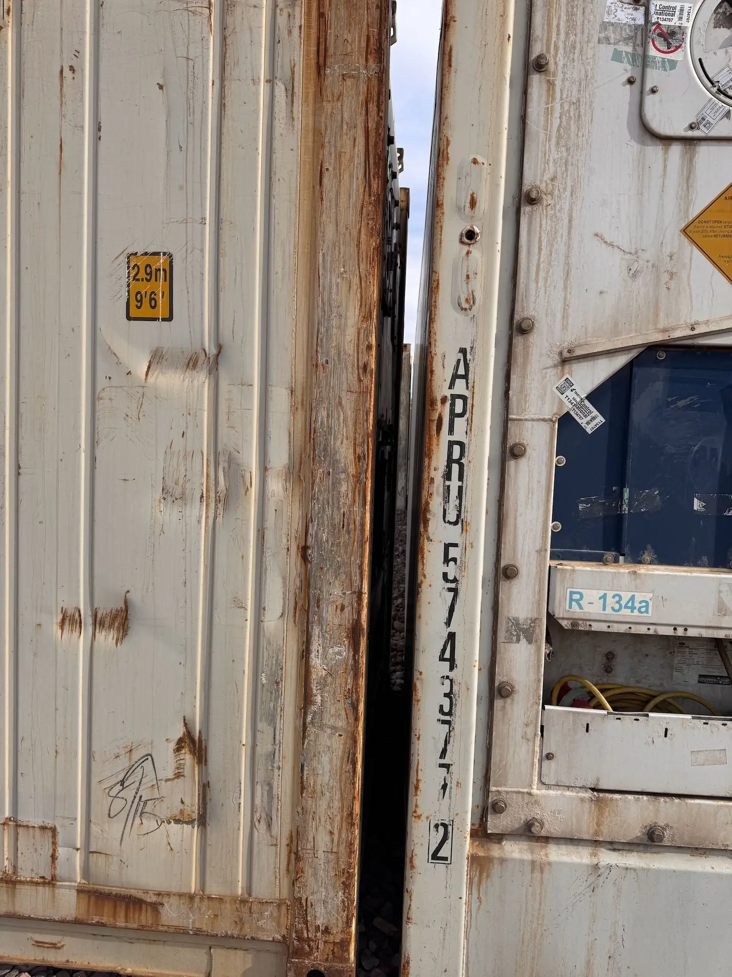 Containers butted together